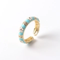 Macro detail of adjustable 18K gold plated ring with light blue enamel flower and zircon - Adjustable Open / 07-Light Blue Gold