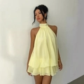 Detail of light yellow tiered chiffon halter mini dress with flowing layered ruffles - S / Dresses / Yellow