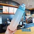 Frosted 1000ml sports water bottle with blue-pink gradient, bounce lid and strap - 1000ml / 2106 Blue
