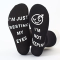 Black cotton crew socks with non-slip letters reading I'm Not Sleeping - Resting Theme - Resting My Eyes
