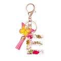 Resin letter E keychain with dried flowers, gold foil, butterfly and pink tassel - Flower Pattern E