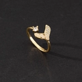Detail of adjustable gold ring with leaf design, cubic zirconia, and opal-like stones - Wing Faux Cat Eye Stone Style