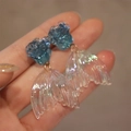Blue crystal butterfly flower earrings featuring a shimmering translucent mermaid tail - Blue Rose Illusion Fishtail Earring