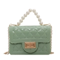 Green jelly handbag with pearl handle, diamond pattern, and gold chain strap - Green