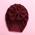 Macro view of burgundy baby headband featuring a large bow and soft knitted texture - 18*21cm / Burgundy