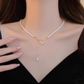Elegant natural freshwater pearl necklace featuring a gold butterfly pendant with crystals - Style AC-009-Freshwater Pearl Butterfly Pendant Necklace