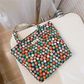 Detailed top view of a colorful polka dot cotton tote bag with sturdy handles - Green Red Polka Dot