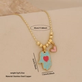 Goldene Hamsa-Halskette mit blauem Emaille und rosa Herzanhänger aus Edelstahl - Blaue Hamsa-Hand / Blau