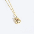 Golden backpack pendant necklace with pink heart gem and shimmering zircon accents - School Bag