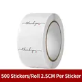 Detail of 2.5cm round white thank you stickers roll with red heart for gift sealing - Cursive Thank You Pattern (C58)