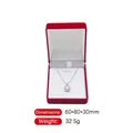 Red flocked jewelry box with white lining holding a silver pendant necklace - Outer Red Inner White
