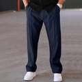 Detail of navy blue relaxed-fit trousers showing elastic drawstring waist and pleated front - S / Bottoms / Navy Blue
