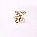 Elegant gold reindeer snowflake napkin ring with intricate antlers on white background - Gold Silhouette Reindeer