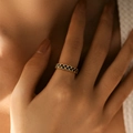 Detail shot of heart-shaped gold ring with blue enamel inlay on a model's hand - Adjustable Open / Blue (KR0037-3)