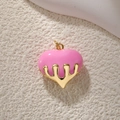 Detailed view of a pink enamel heart pendant with molten gold drip effect metalwork - Medium 3D Pink