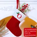 Red knit Christmas stocking with white letter O embroidery and holly leaf decoration - Letter O / Red