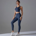 Detail eines dunkelblauen High-Waist-Yoga-Sets mit Sport-BH und Hose für Fitness-Training - S / Marineblau