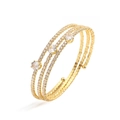 Detail of gold multi-layer open cuff bracelet with sparkling clear stones and round accents - Style B Gold White Zirconia Bangle