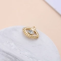 Close-up of gold-plated eye pendant with crystal inlay on marble display stand - Evil Eye Marquise Style (9#)