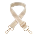 Detail of wide woven bag strap with gradient beige pattern and gold metal hooks - White Off-white