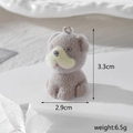 Macro view of a grey flocked dog pendant with size dimensions 3.3cm by 2.9cm - Bearded Shar Pei