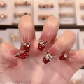 Short coffin press-on nails with red gradient, sparkling glitter, and pearl accents - Z507 Red Wall Tiles / Nail Glue Version