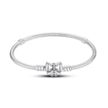 Detail of silver snake chain bracelet featuring a sparkling crystal butterfly clasp - 17cm / Silver