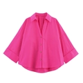 Detail of pink cotton poplin shirt with V-neck, lapel collar, and wide dropped sleeves - Rose Red