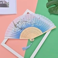 Classic folding fan with pink-blue gradient, white cherry blossoms and pink butterfly - Blue Spring Flowers