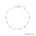 Detail view of gold beaded choker necklace with evil eye charms and length 40+5cm - Colorful Evil Eye and Pearl Style (N2450-GO)