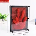3D pin art clone hand mold toy in medium red plastic with a transparent acrylic panel - Medium / Red