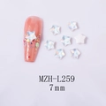 Macro shot of 7mm iridescent star nail art charms and application on pink glitter nails - 7-Point Star - White Mocha (L259)
