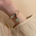 Elegant Chinese style hand-woven bracelet with green Shoushan stone and agate beads - 37# White Lotus Seed Pod Style