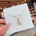 Collana in acciaio al titanio dorato con ciondolo a forma di orsetto e cristallo a cuore - Stile orso di diamante (X238) / Oro