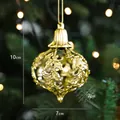 Golden Christmas bell pendant with hollow leaf design on tree, 10cm x 7cm size - Onion Ball