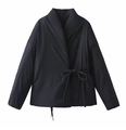 Macro detail of black kimono-style coat featuring side-tie closure and matte fabric texture - XS / Black