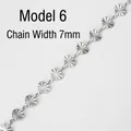 Detail of 7mm silver stainless steel heart chain with sunburst texture links - 6# Textured Heart (7mm Width)