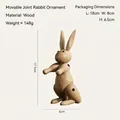 Détail d'une figurine de lapin en bois aux articulations mobiles avec grain naturel - Lapin Articulé