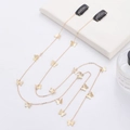 Elegante gouden vlinder haarketting met strass clips op een witte achtergrond - Vlinder Lange Kwast Haarketting / Gouden Paar (FJ0212)