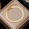 Flat gold snake chain bracelet with adjustable extender on a premium jewelry box - Gold Classic Snake Chain