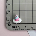 Mini pink resin unicorn horn with white cloud base measured on a scale mat for DIY deco - Unicorn Horn Cloud-Multicolor