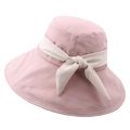 Detail of soft pink wide brim sun hat with delicate beige bow ribbon and fine texture - M (56-58cm) / Pink