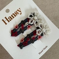 Detail of handmade navy fabric hair clips with floral embroidery and white pearl beads - Black