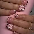 Pink press-on nails with black leopard french tips and 3D iridescent bows - 2XG1-13392 (Pink Leopard Iridescent Bow Square)