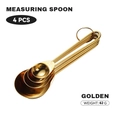 Set of 4 golden stainless steel measuring spoons with engraved scale and ring connector - Golden Wire Handle Measuring Spoons Set of 4