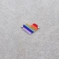 Detail of a handmade rainbow heart charm made of Miyuki seed beads on gray felt - 005-Rainbow Heart