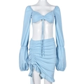 Detail of light blue two-piece set featuring drawstring ruched skirt and cropped top - L / Blue
