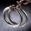 Minimalist silver surgical steel hoop earrings with polished finish on a display stand - Silver Mirror Hoop-16mm