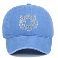 Close-up of silver tiger head embroidery on a washed navy cotton baseball cap - Light Blue