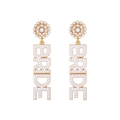 Elegant gold-tone bridal drop earrings featuring BRIDE lettering and faux pearls - White